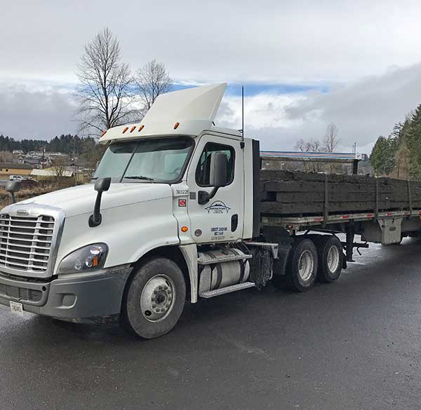 A flatbed truck for specialty item transportation