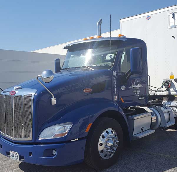 A dedicated truck on the highway providing line haul services
